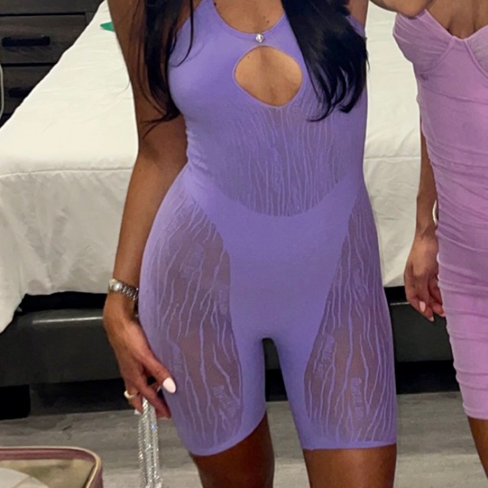 White fox Purple “Keep them Guessing” Romper - One size fits all